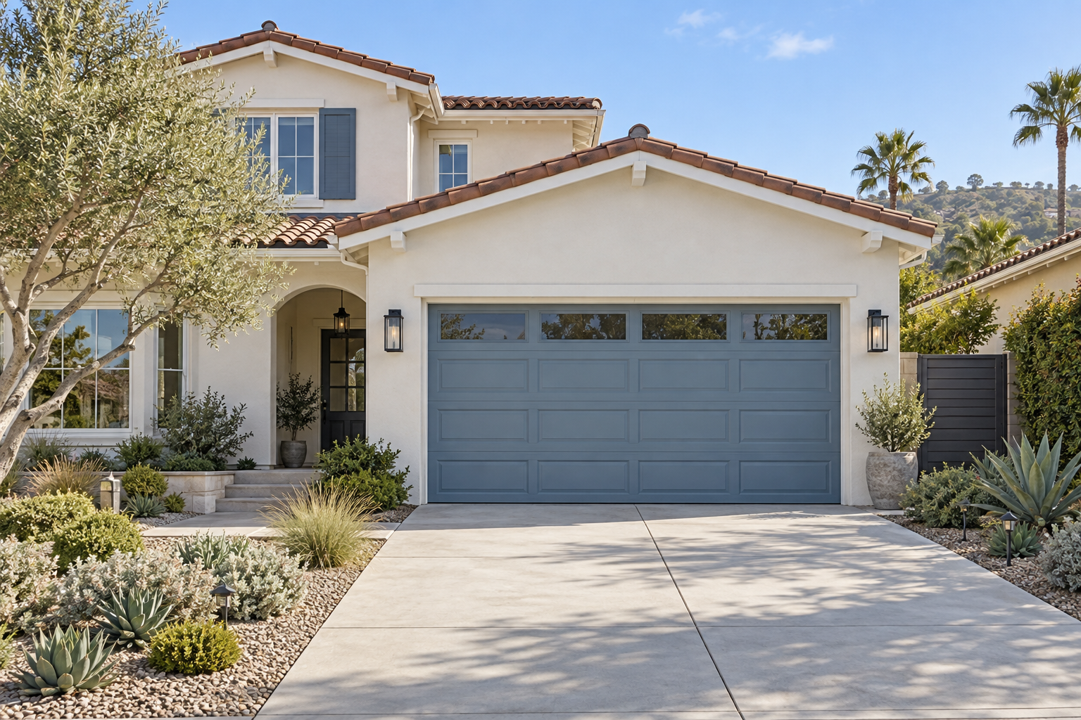 Illustrative home with a blue sectional garage door